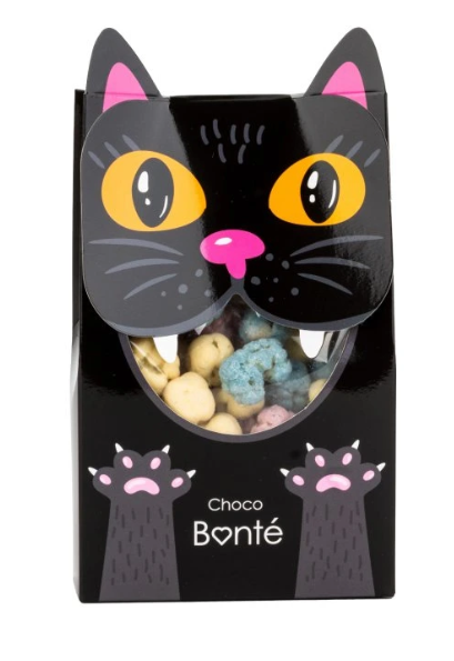 Černá kočička - meruňkové kostičky v bílé čokoládě